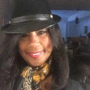 Sparkle E in Fashionable Hat